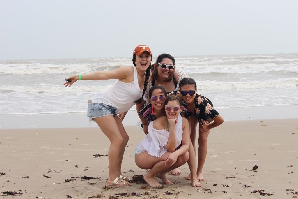 friends at the beach laughing